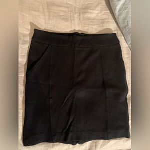 Esprit brand, size XS black stretchy skirt. Silver zipper along back.